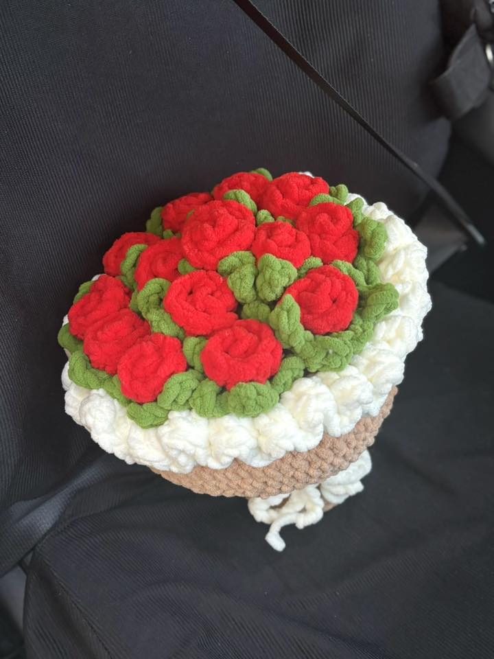 A round pot of crocheted roses, seen from above